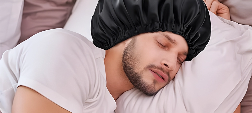 man wearing a satin bonnet to bed