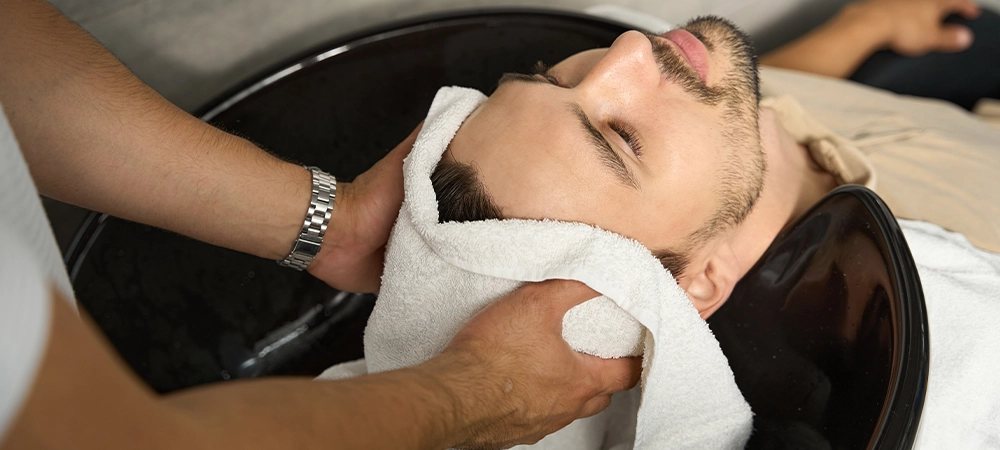 rubbing men hair with a regular towel